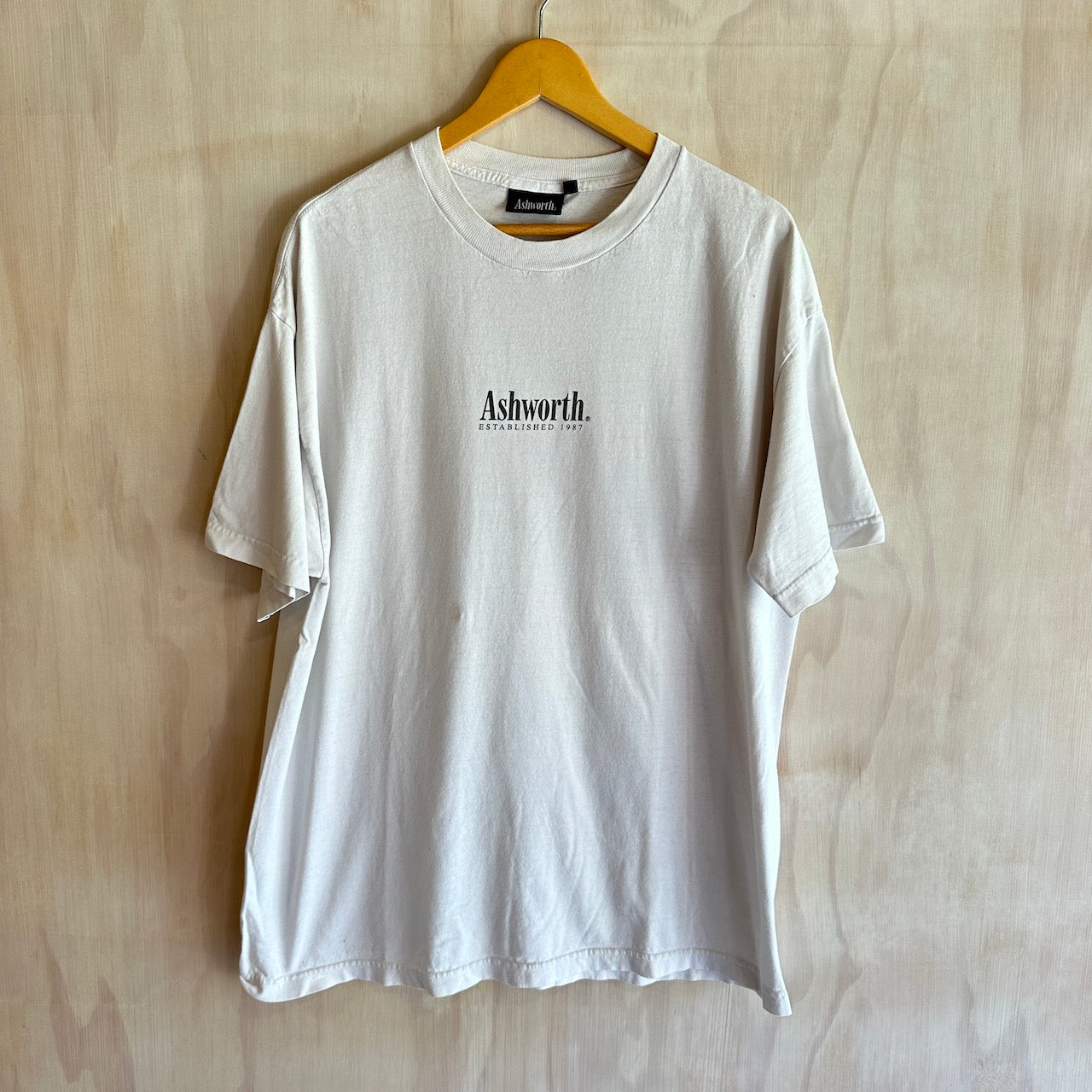 Vintage Ashworth Golf tee, light stains (L)